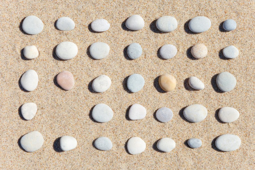 Pebbles in formation on a beach